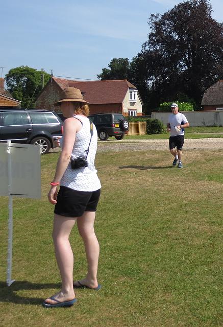IMG_5655.JPG - Sarah poised with stopwatch to record Rob's winning finish