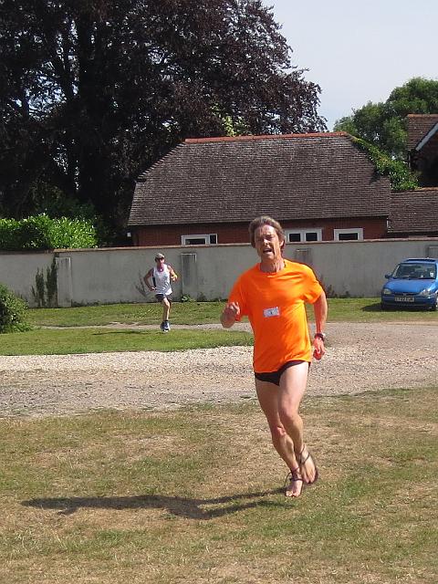 IMG_5659.JPG - David finishes strongly to make up time after having stopped twice to tie up his flip flops.
