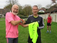IMG 2719  Jim is presented with his 100 runs tee-shirt